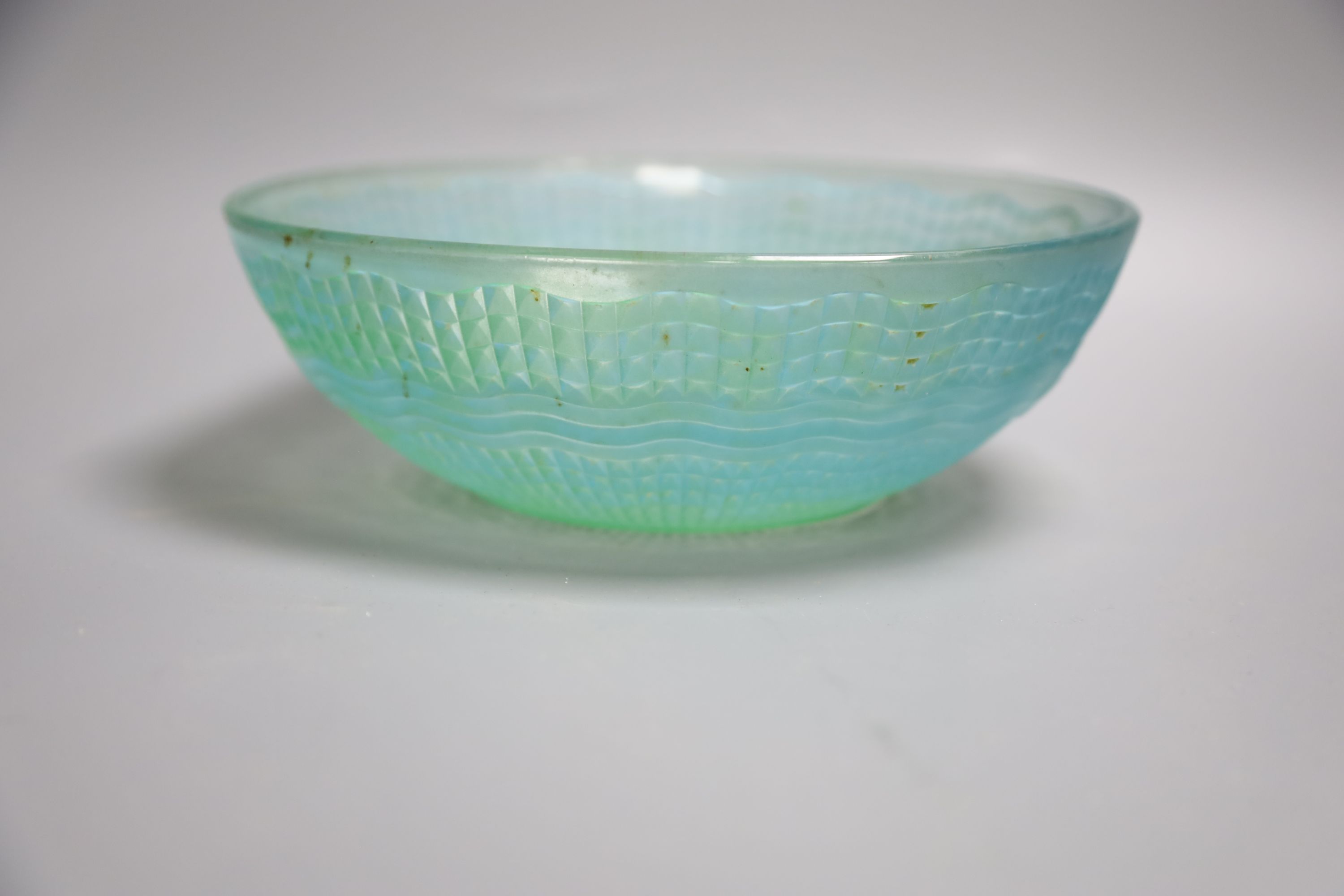 A Lalique post-war fern-rimmed circular bowl with octagonal interior and a green glass fruit bowl Dia 28cm; 24cm